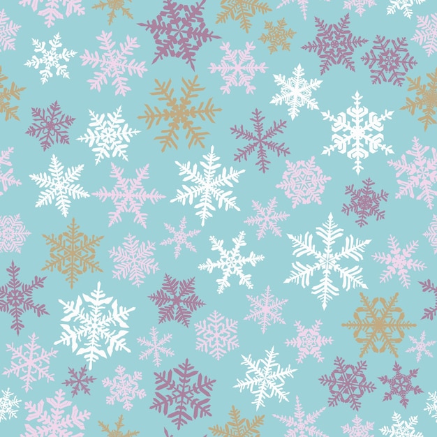 Patrón sin fisuras de navidad con copos de nieve grandes y pequeños complejos de color sobre fondo azul claro