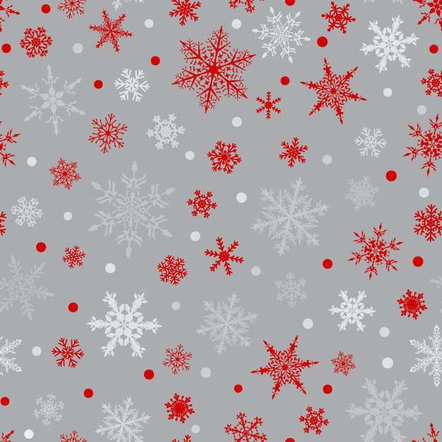 Patrón sin fisuras de Navidad de copos de nieve rojos y blancos sobre fondo gris