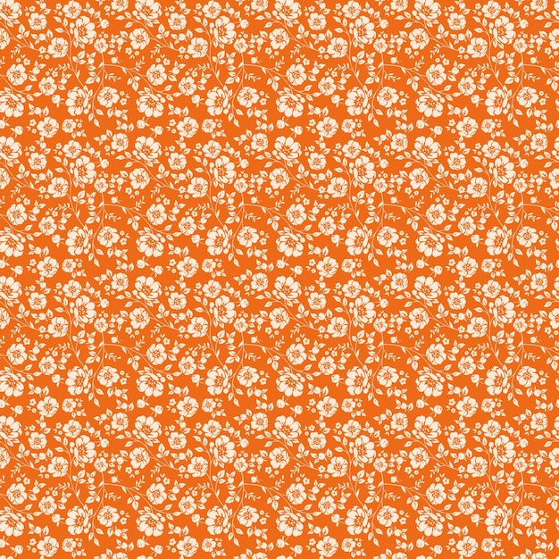 un patrón floral blanco en un fondo naranja