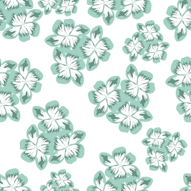 un patrón de flores que están en azul y verde
