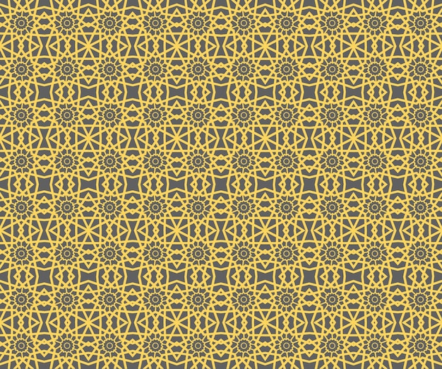 Patrón geométrico dorado sobre un fondo gris