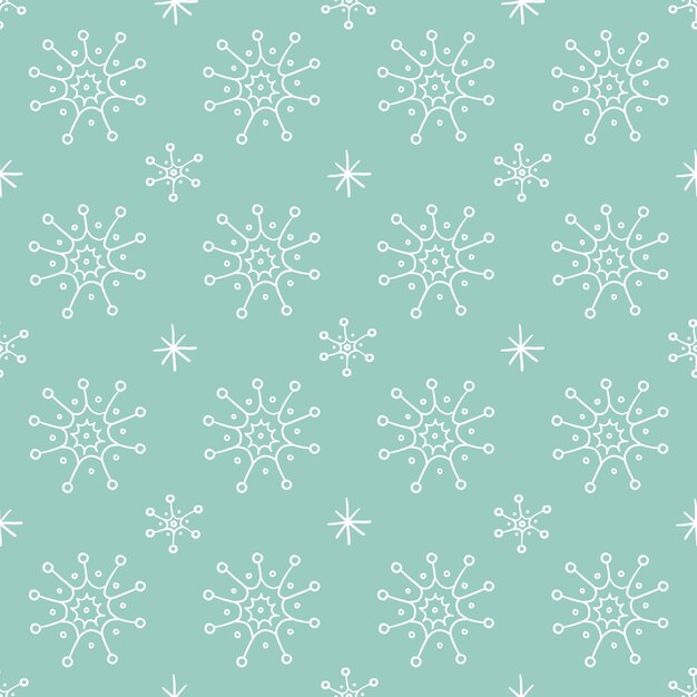 Patrón de invierno con copos de nieve dibujados a mano. Bonito diseño monocromático. Fondo de Navidad.