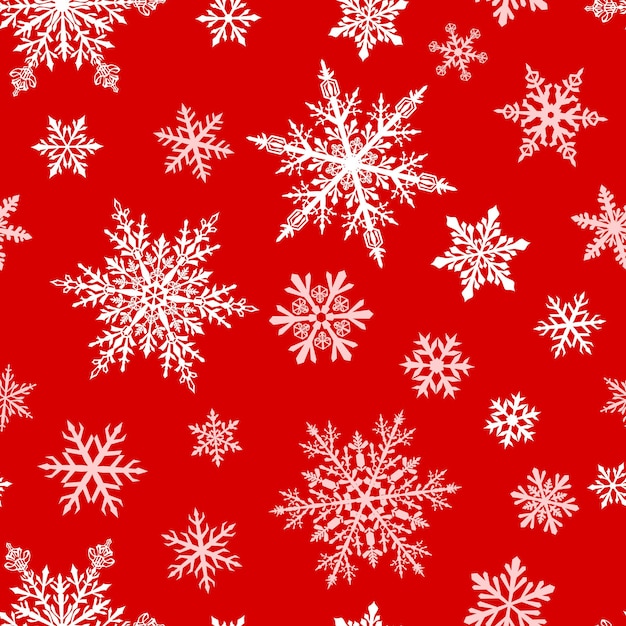 Patrón navideño sin fisuras de complejos copos de nieve grandes y pequeños en colores blancos sobre fondo rojo