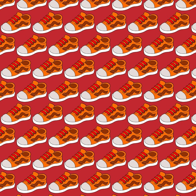 Patrón repetitivo de zapatillas de deporte naranja y blancas con cordones rojos