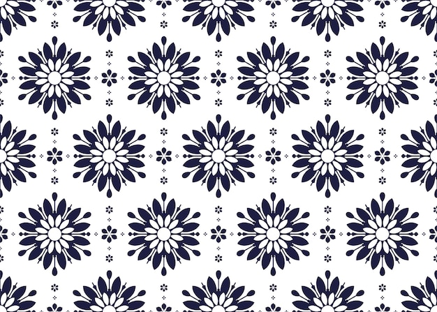 Patrón de tela étnica de color azul y blanco sin costuras con diseño floral de símbolo decorativo para la tela