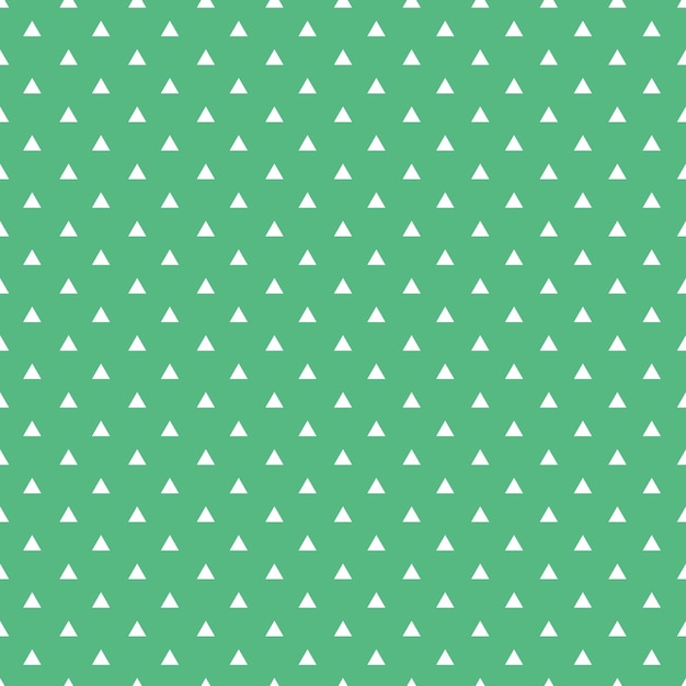 Patrón de triángulos sin costura blanca sobre fondo verde