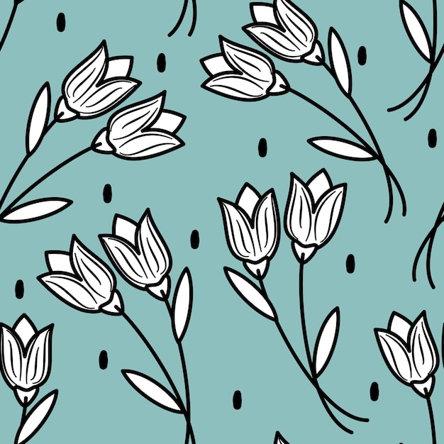 patrón vectorial sin costuras con tulipanes blancos y negros sobre fondo azul