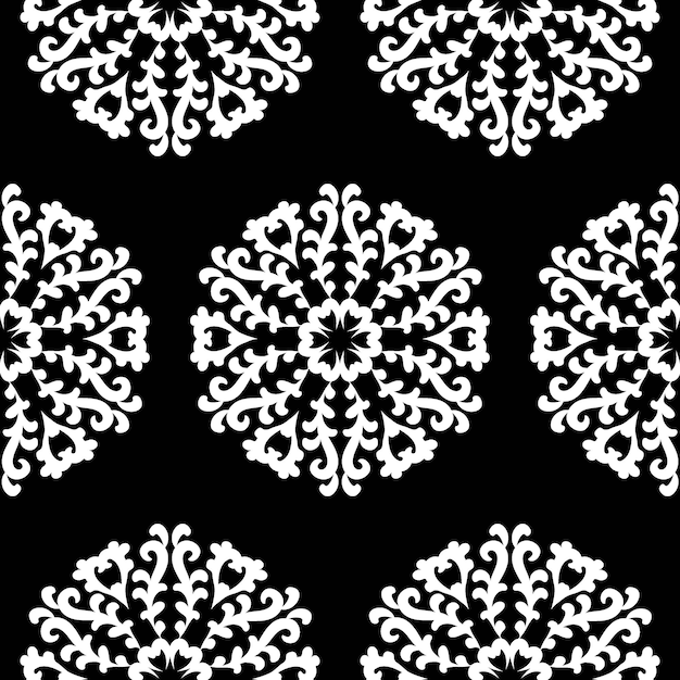 Patrones de encaje redondo blanco sobre un fondo negro Hermoso fondo transparente con mandalas florales