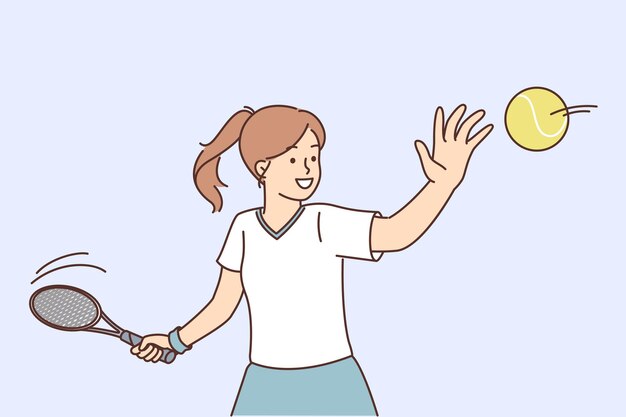 La pequeña tenista entrena golpeando la pelota con la raqueta queriendo marcar un gol para el oponente
