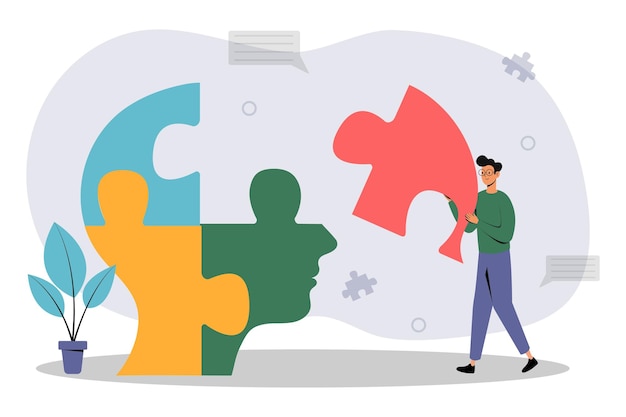 Una persona montando piezas de rompecabezas que representan la salud mental en un espacio de trabajo creativo