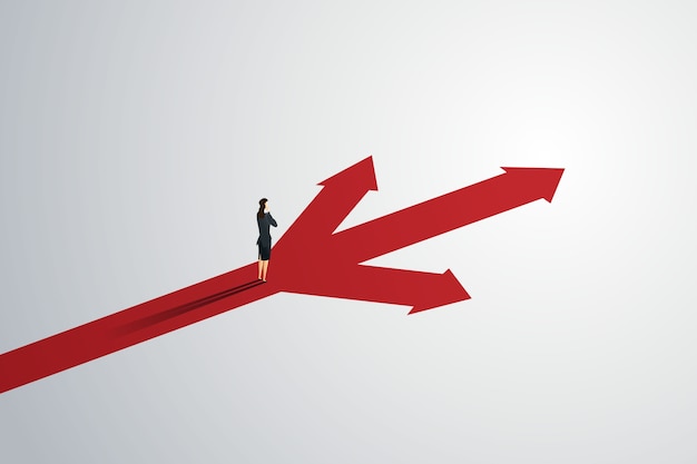 La persona de negocios mira la flecha hacia arriba en el camino hacia el éxito de la meta.