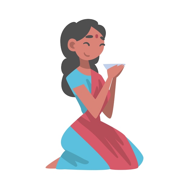 Personaje indio con sari sentado en el suelo con un cuenco comiendo Ilustración vectorial