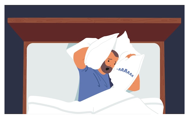 El personaje masculino sufre de insomnio debido a los ronquidos o al ruido fuerte en la habitación de noche. El hombre ansioso cubre las orejas con almohadas.
