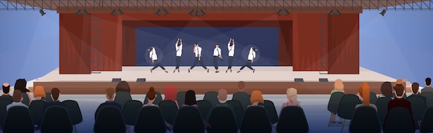 Las personas sentadas en sillas y viendo en el grupo de baile de rendimiento bailando en el escenario con cortinas concepto moderno salón interior plano horizontal