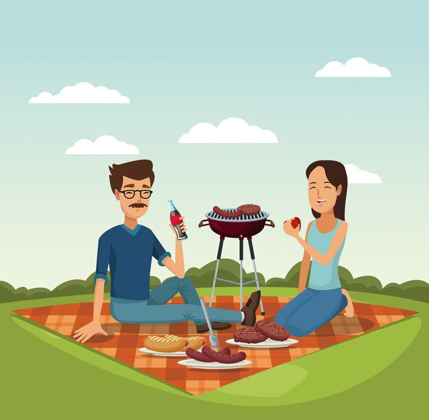 picnic y parrilla barbacoa en hierba con hombre y mujer