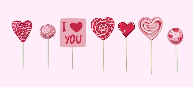 Piruletas para el Día de San Valentín Piruleta en espiral en forma de corazón y caramelos redondos en un paquete de plástico transparente aislado
