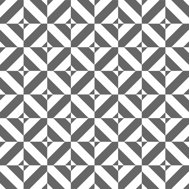 Un piso de azulejos monocromáticos con un patrón sin costuras formado por cuadrados y triángulos