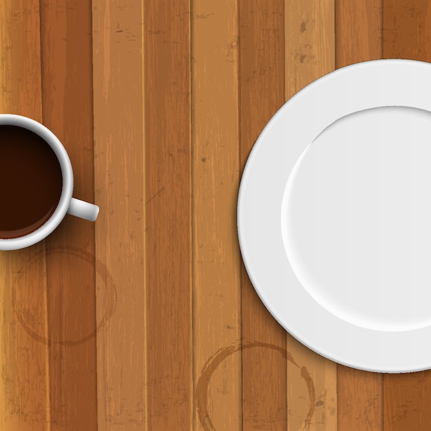 Plato y taza de café en madera