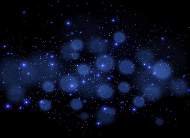 El polvo es azul, chispas azules y estrellas azules brillan con una luz especial Partículas de polvo mágicas brillantes