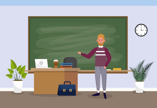 Profesor hombre con educación portátil en el aula