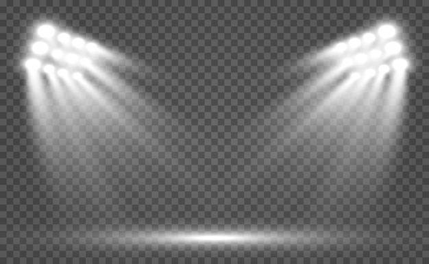 Proyectores del estadio brillantemente iluminados. Aislado en un fondo transparente Luces brillantes. Escena iluminada