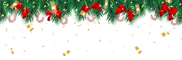 Ramas de árbol de Navidad con bastón de caramelo y lazo rojo