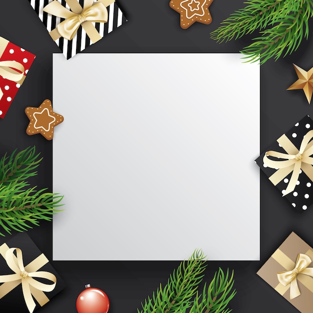 Ramas de los árboles de Navidad y caja de regalo con copyspace blanco