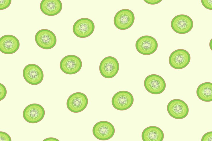 Rebanadas de kiwi verde con un diseño de patrón sin costuras sobre un fondo verde claro