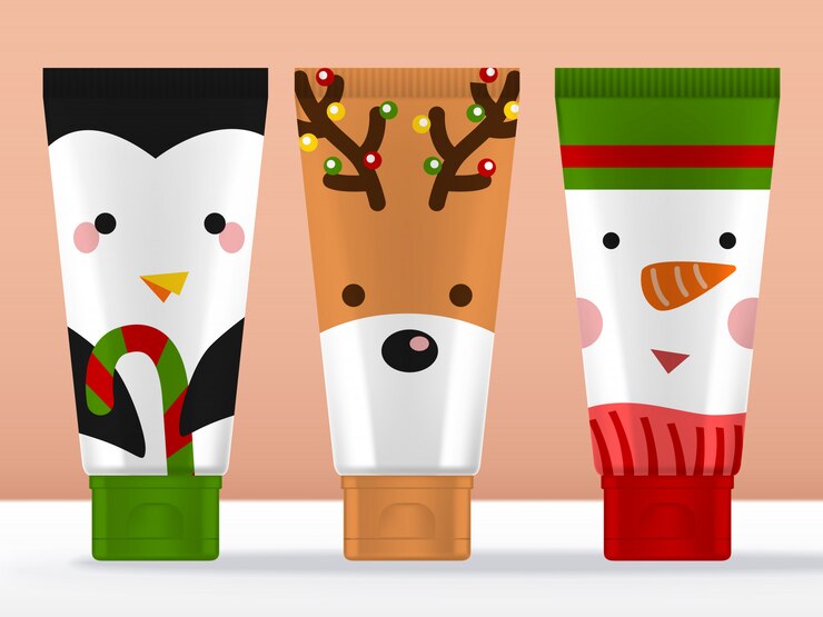 Regalo de saludo de temporada, personajes navideños Tubo de crema de manos Empaquetado con mascotas de pingüino, reno y muñeco de nieve.