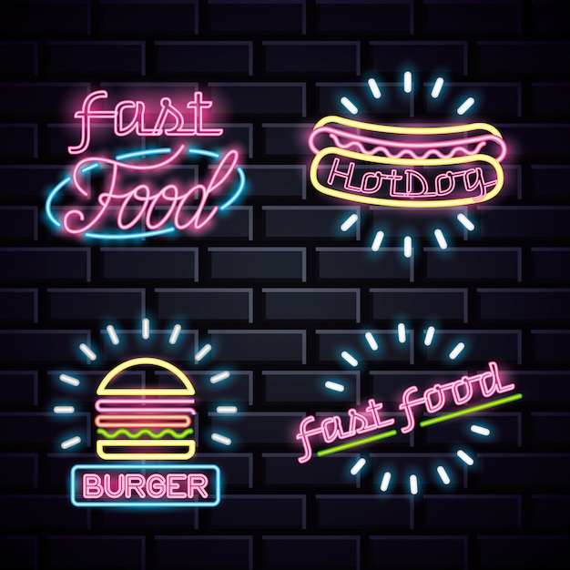 Restaurante de luces de neón de publicidad en pared de ladrillos.