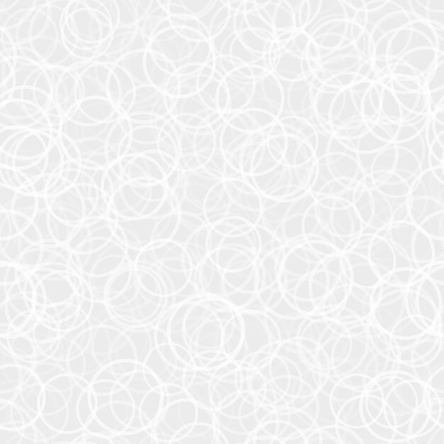 Resumen de patrones sin fisuras de contornos de círculos dispuestos al azar en colores blanco y gris
