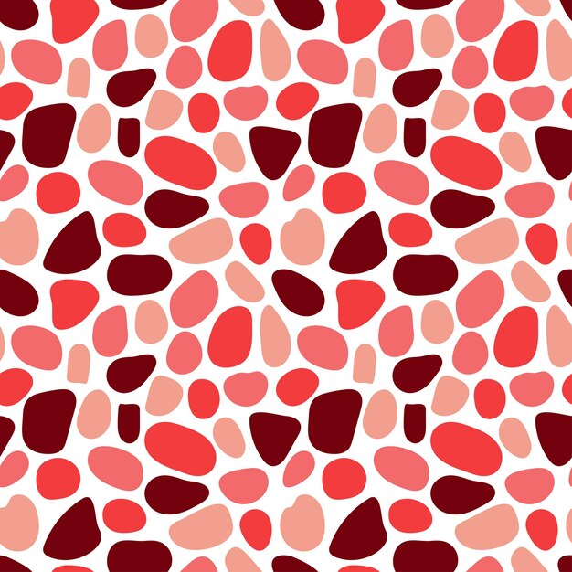 Resumen de patrones sin fisuras con elementos redondeados de color rojo y rosa sobre un fondo blanco.