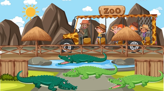 Safari en la escena diurna con muchos niños viendo el grupo de caimanes.