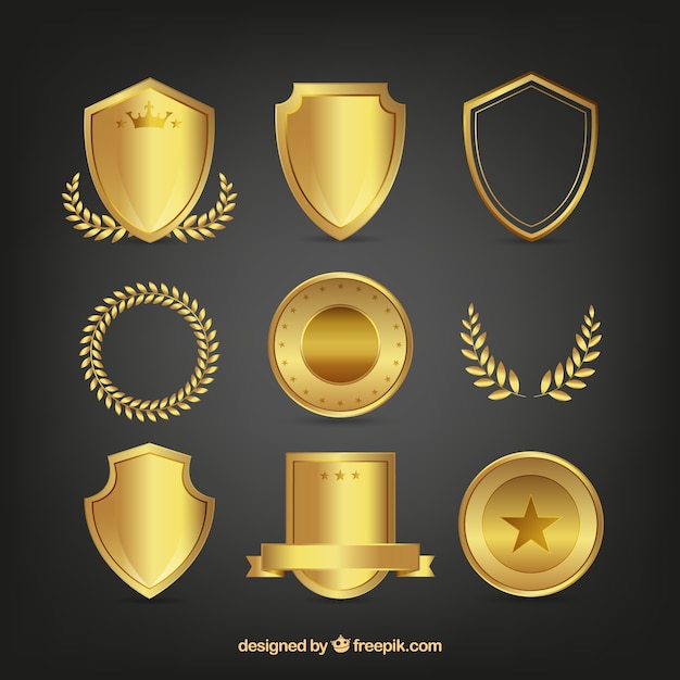 Vector set de escudos dorados y coronas de laurel