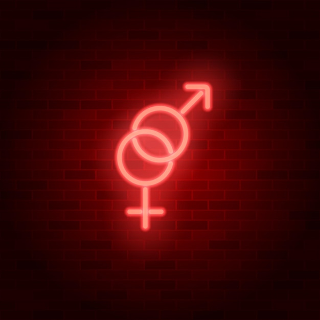 Signo de heterosexualidad de neón símbolo rojo masculino y femenino en la pared de ladrillo