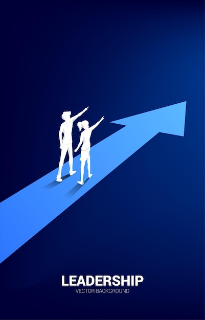 La silueta del hombre de negocios y la mujer de negocios apuntan hacia adelante con el concepto empresarial de flecha de la visión de la misión y el liderazgo