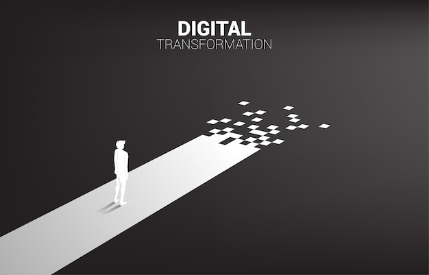 Silueta de hombre de negocios de pie en el camino con píxeles. concepto de transformación digital de negocios.