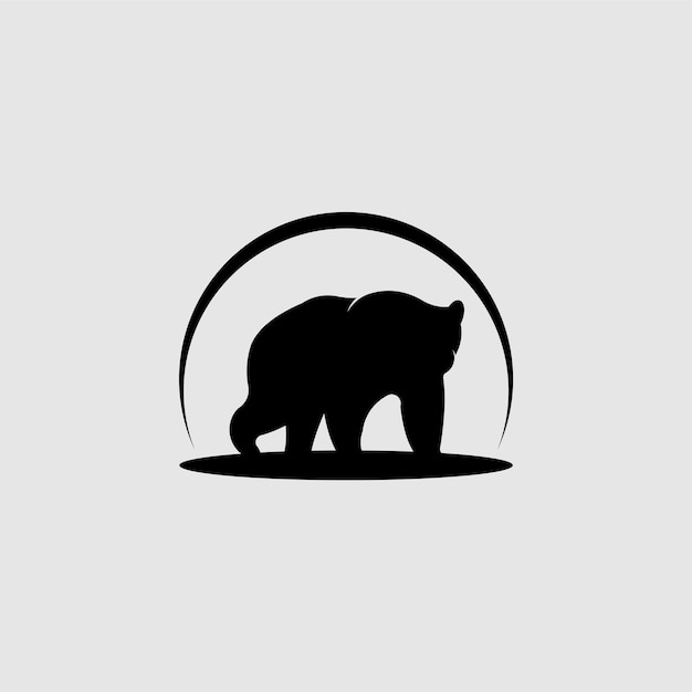 Una silueta de oso con un círculo en el centro.