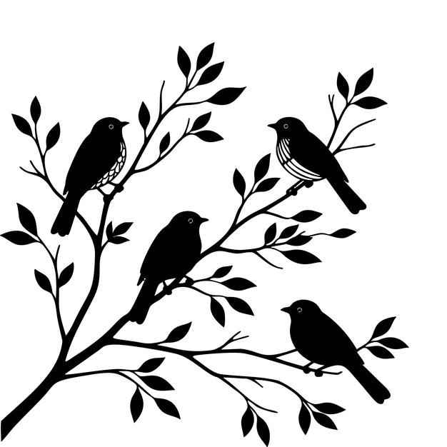 Silueta de pájaros posados en una rama