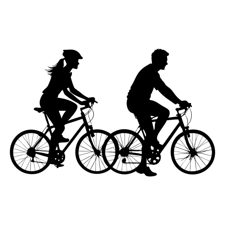 La silueta de una pareja de ciclistas aislada sobre un fondo blanco