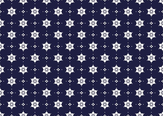 Símbolo blanco floral en fondo azul oscuro tela étnica diseño de patrón sin costuras para tela, etc.