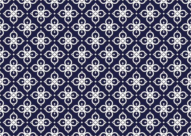 Símbolo blanco floral en fondo azul oscuro tela étnica diseño de patrón sin costuras para tela, etc.
