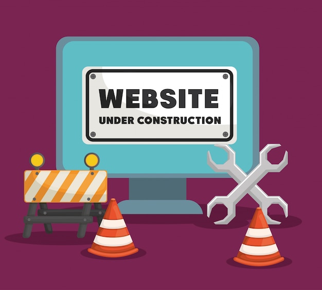 Sitio web en construcción con computadora de escritorio