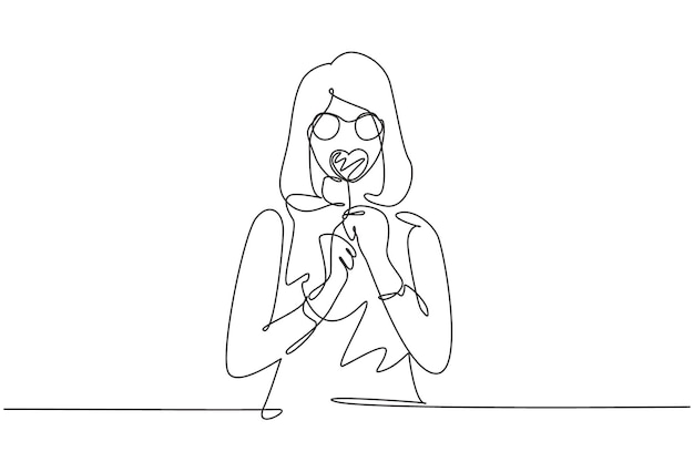 Un solo dibujo de una línea mujer fresca con una piruleta en forma de corazón soplando labios rojos ilustración vectorial