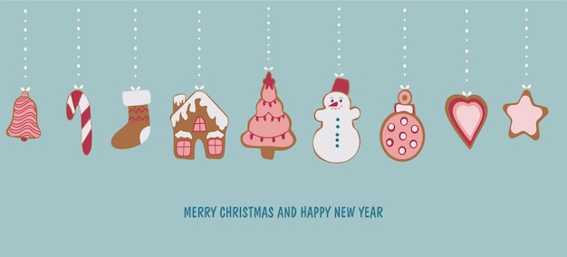 Tarjeta de Año Nuevo Colgando juguetes del árbol de Navidad en forma de galletas de jengibre
