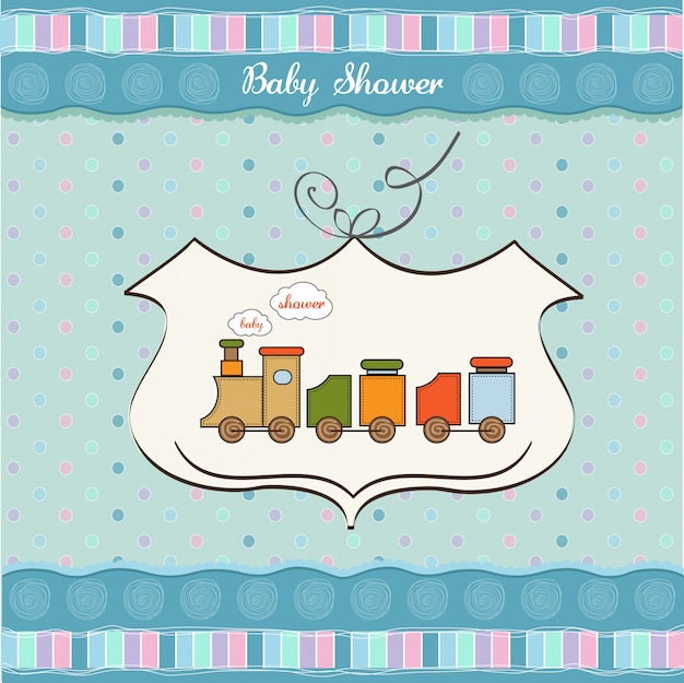 Tarjeta de baby shower con tren de juguete.