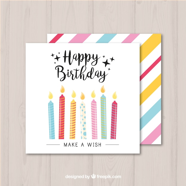 Vector tarjeta de cumpleaños con velas coloridas