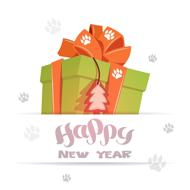 Tarjeta de felicitación feliz año nuevo caja de regalo grande sobre pie de perro se imprime sobre fondo