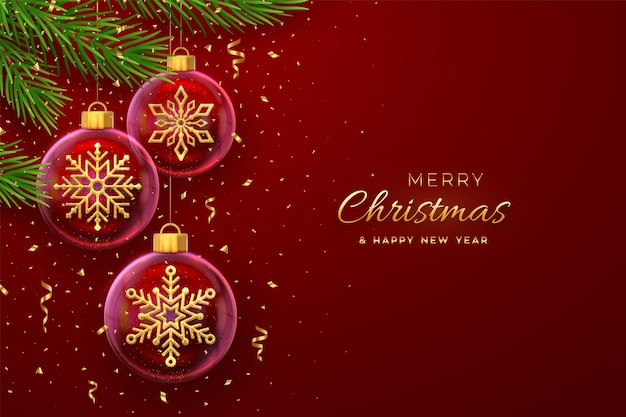 Tarjeta de felicitación de Navidad colgada en una rama de pino bolas de vidrio transparente con copos de nieve en el interior