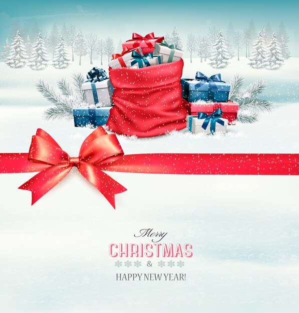 Tarjeta de feliz Navidad con una cinta y cajas de regalo.